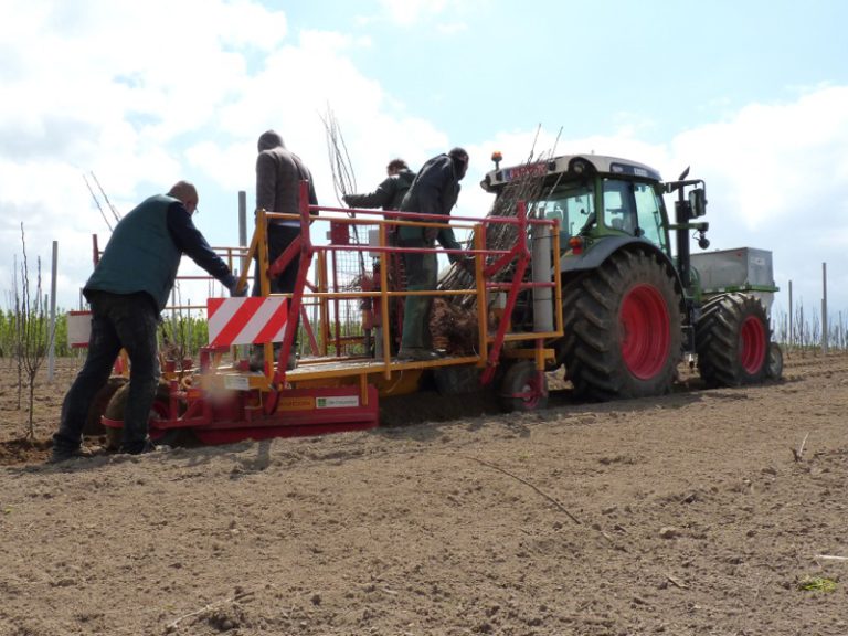 PL-40 F2 fruit tree planting machine including drilling of concrete piles on GPS