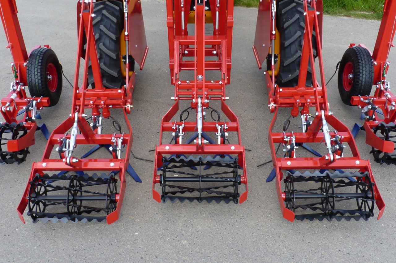 SF hoe frame cultivator mounted on a Multitrike high clearance tractor