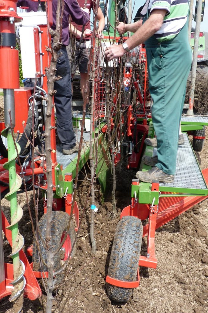 Hole drill for concrete poles on the PL-40 F3 fruit tree plant machine