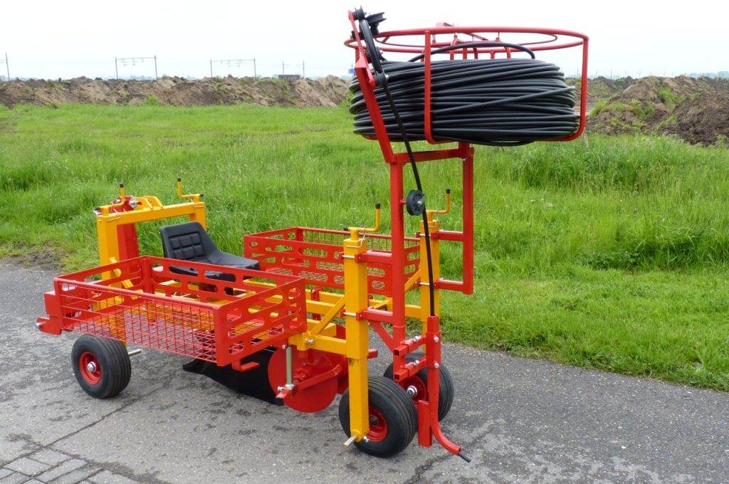 Paulownia planting with the Damcon PL-10 and drip hose laying