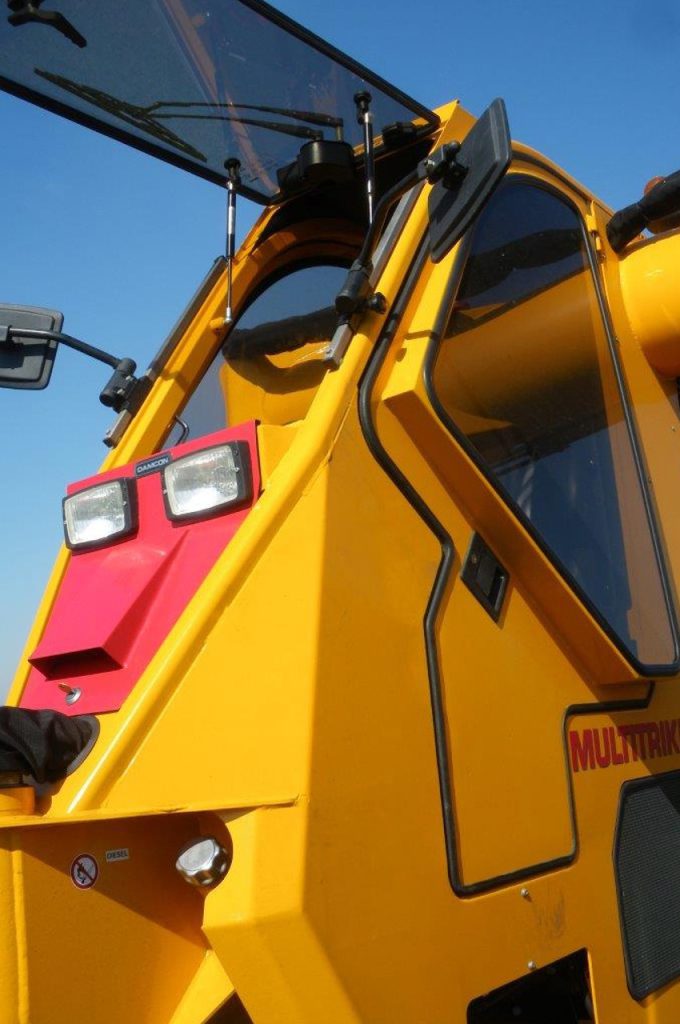 Widened doors for Multitrike high clearance tractor