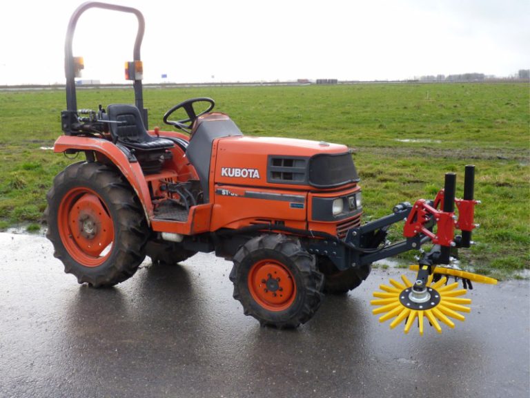 Finger weeders in front of Kubota